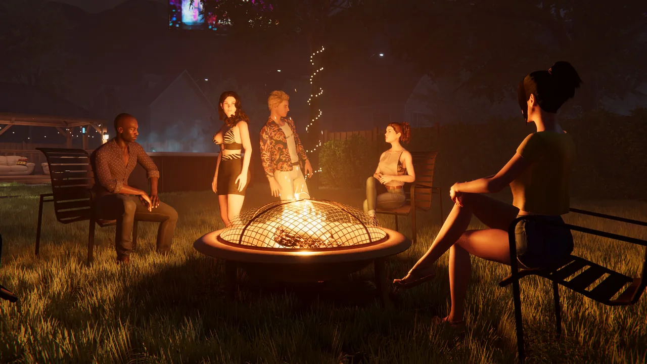 Guests gathered around the fire pit in the backyard at night